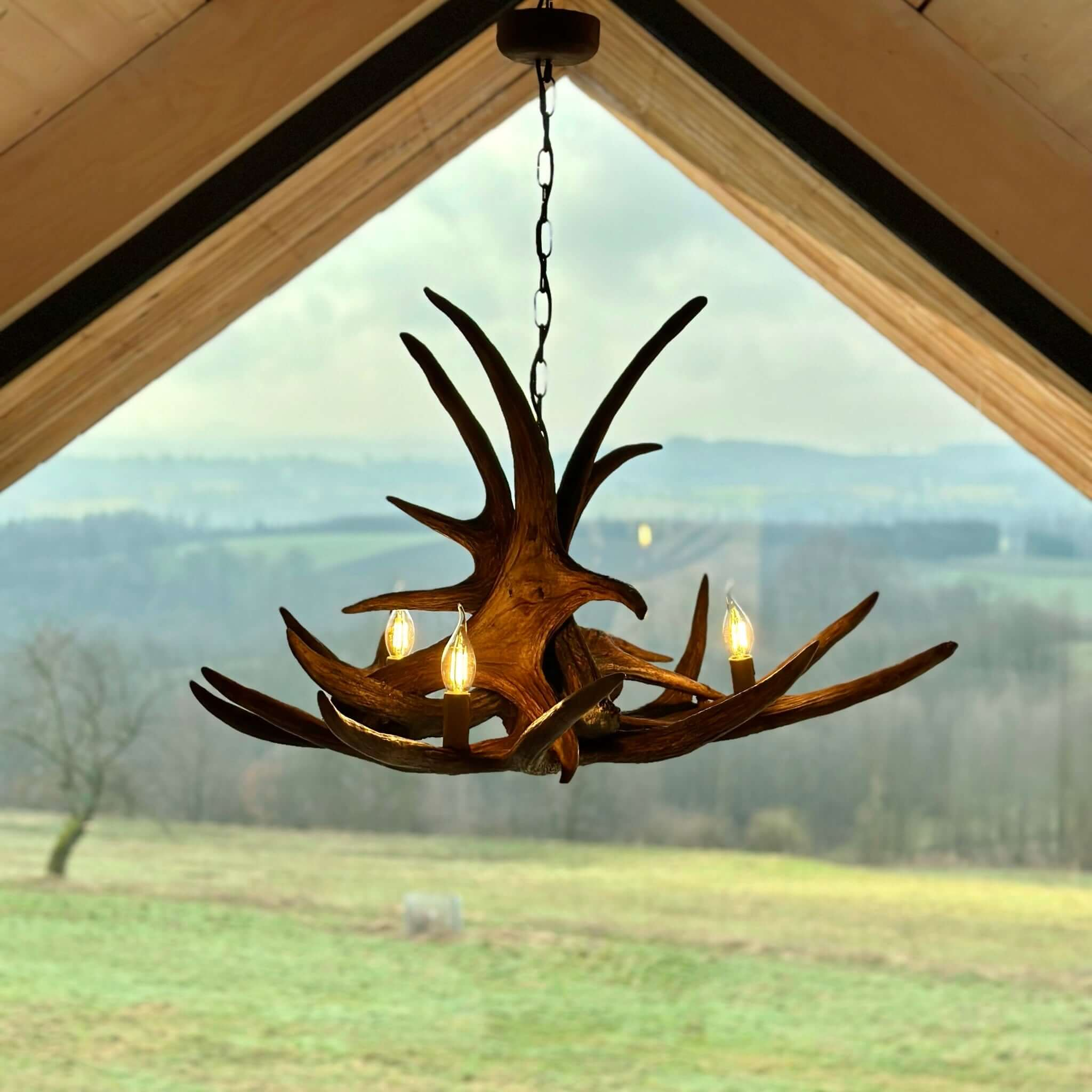Real antler chandelier in rustic style
