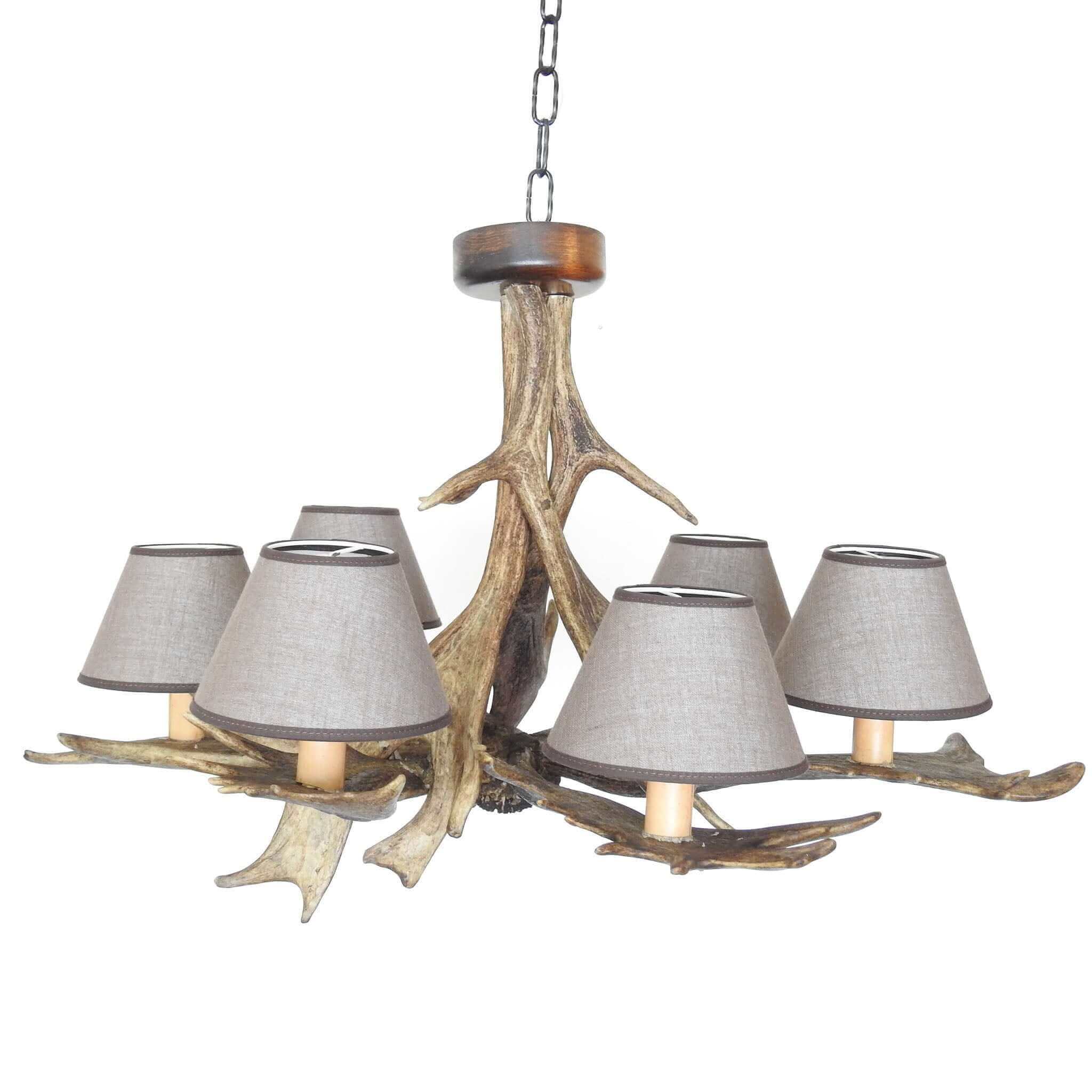 Living room antler chandelier with shades.