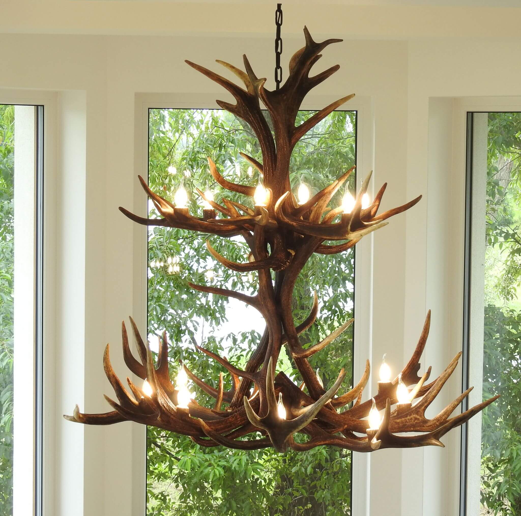 Large antler chandelier made of real red deer antlers.