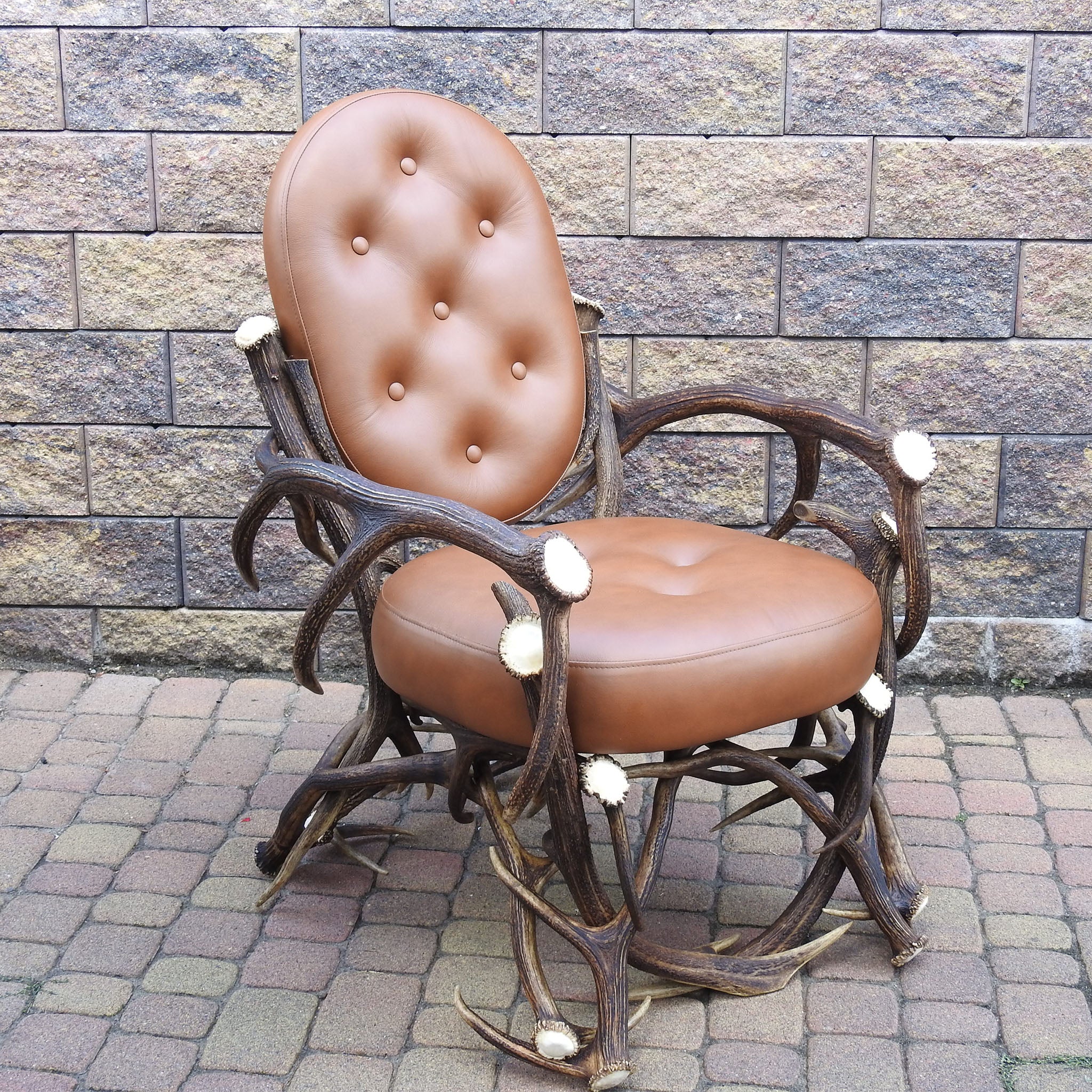 Real antler chair with cowskin.