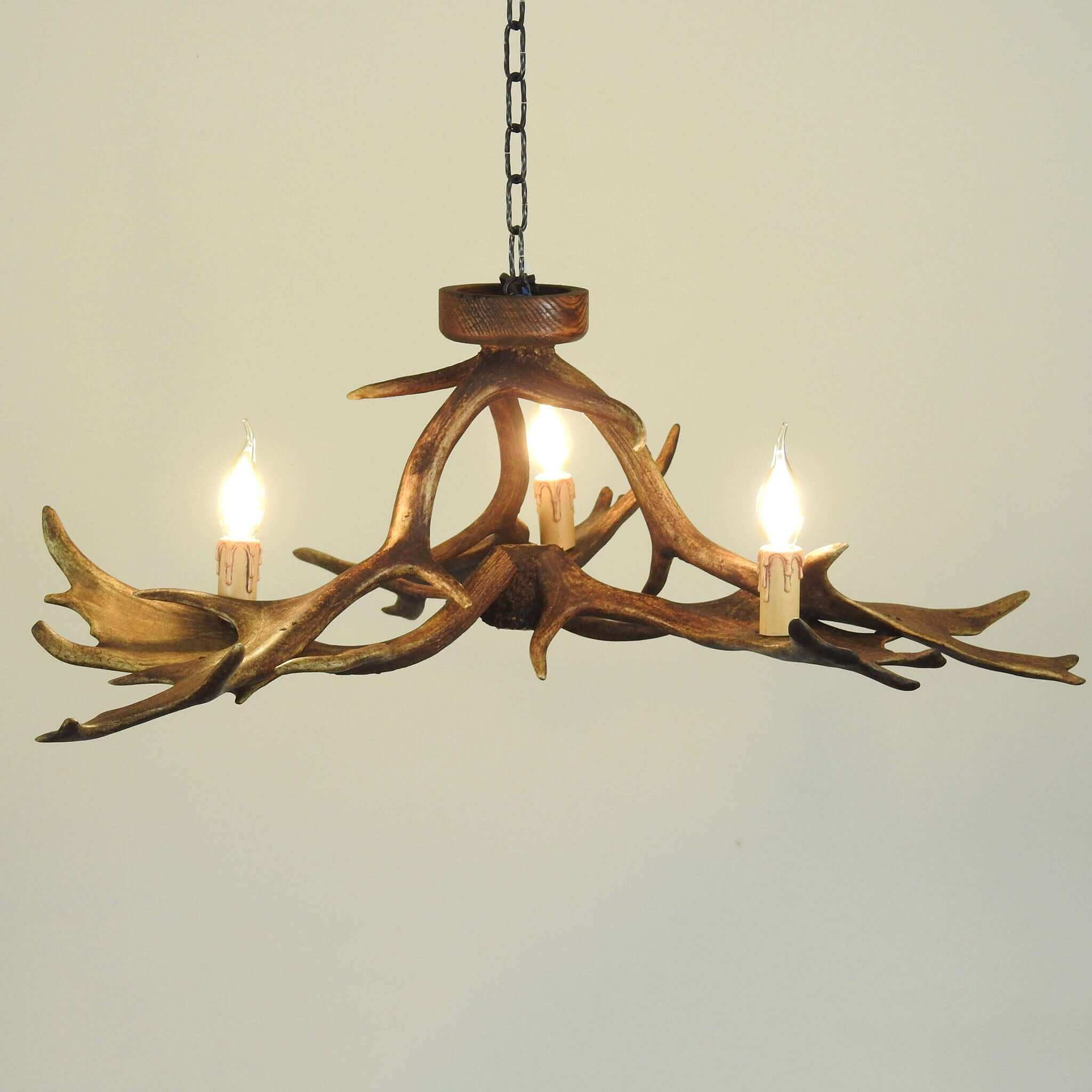 Low ceiling antler chandelier.