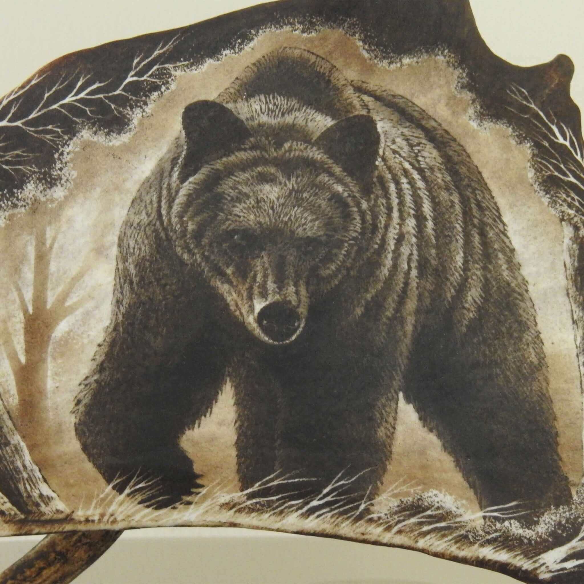 Antler carving shows bear