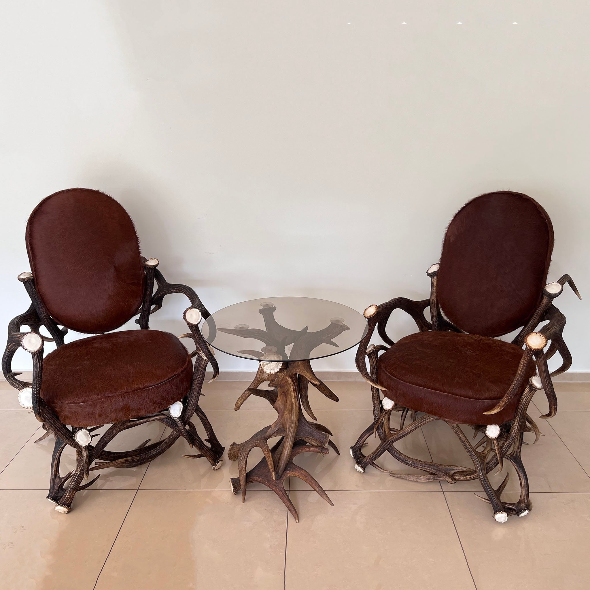 Antler furniture: deer antler chairs and moose antler table.