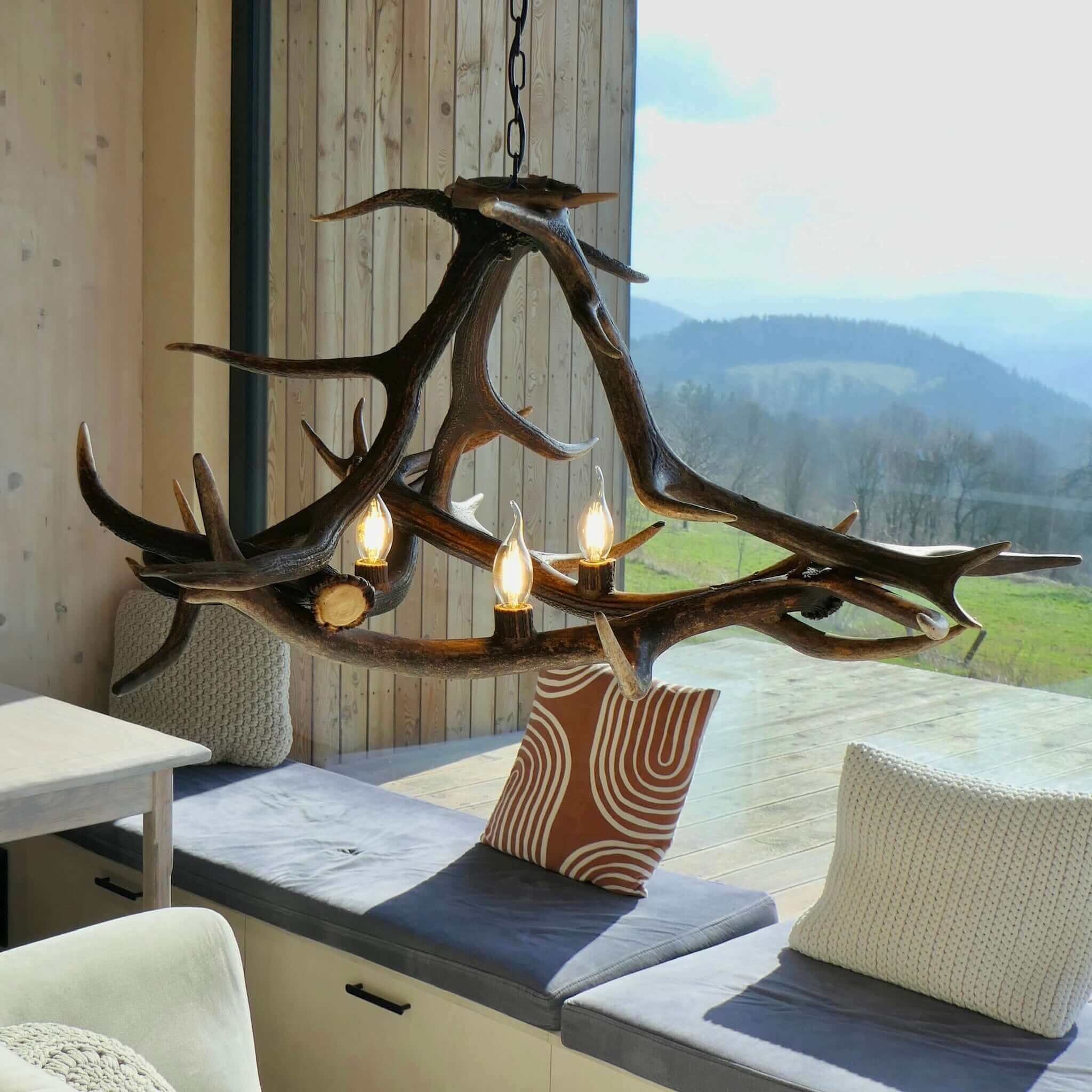 Real deer antler chandelier for 3 lights.