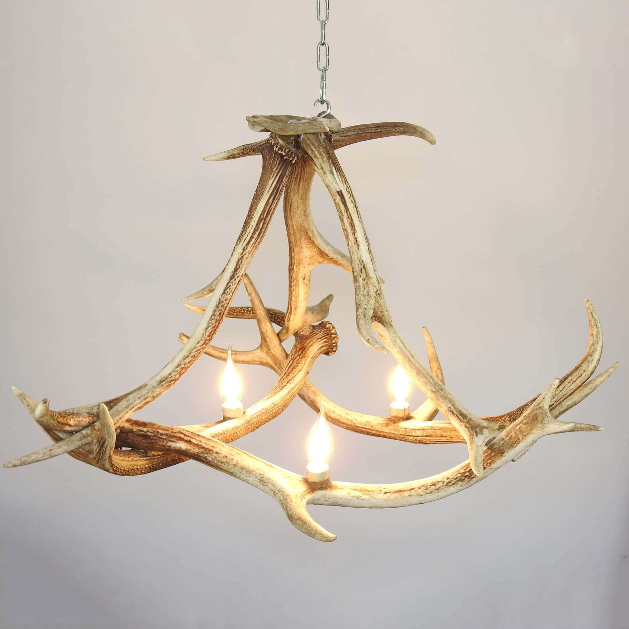 Triangle shape antler chandelier.