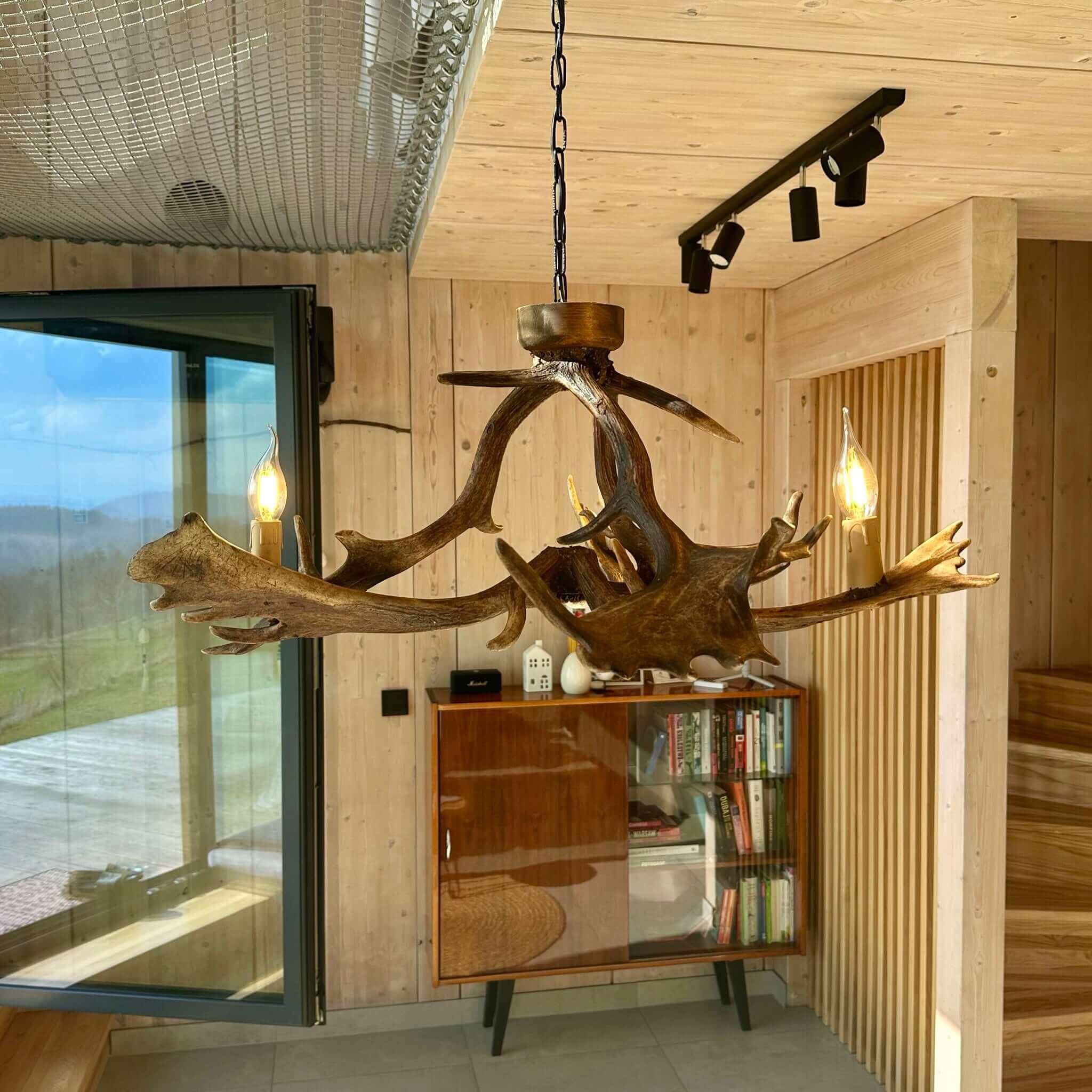 Antler chandelier for 3 lights in living room.