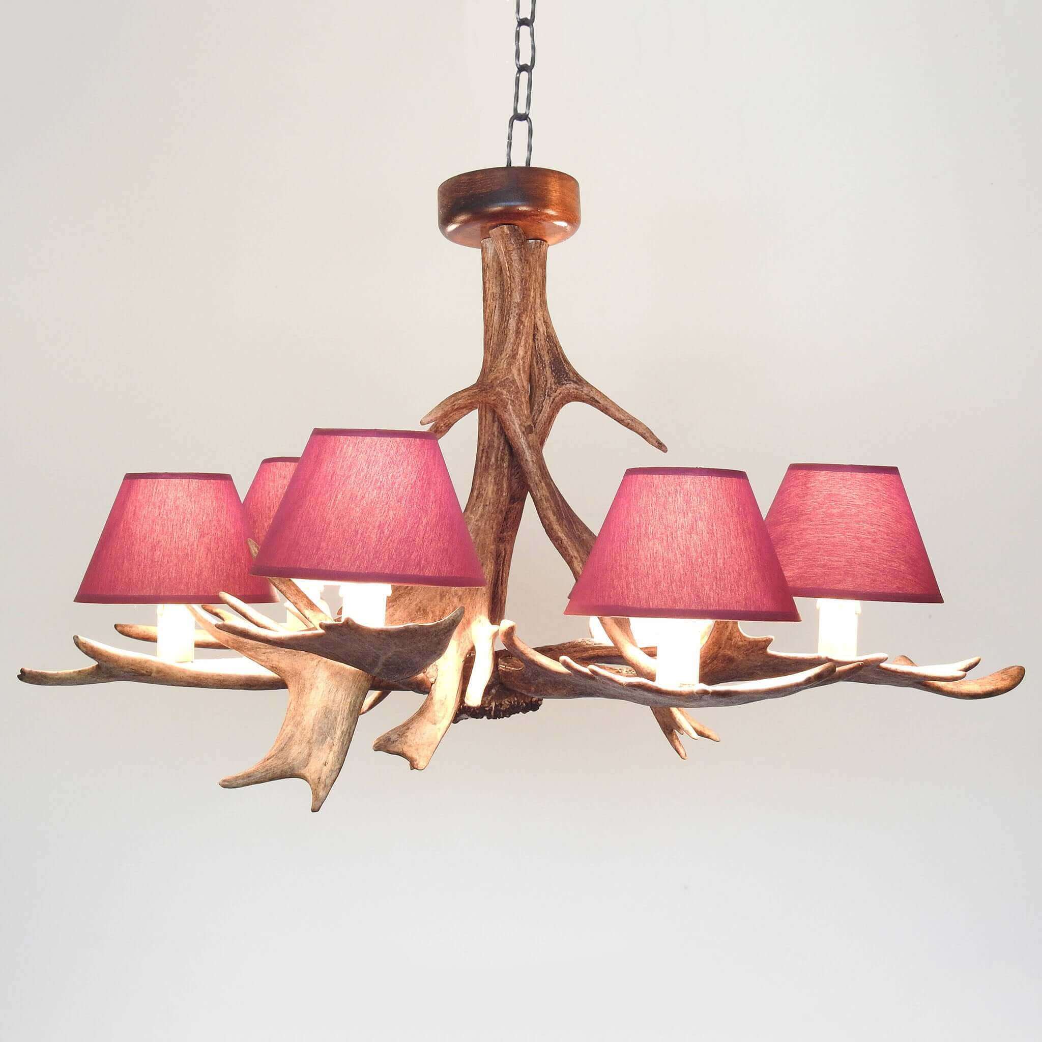 Antler chandelier with shades.