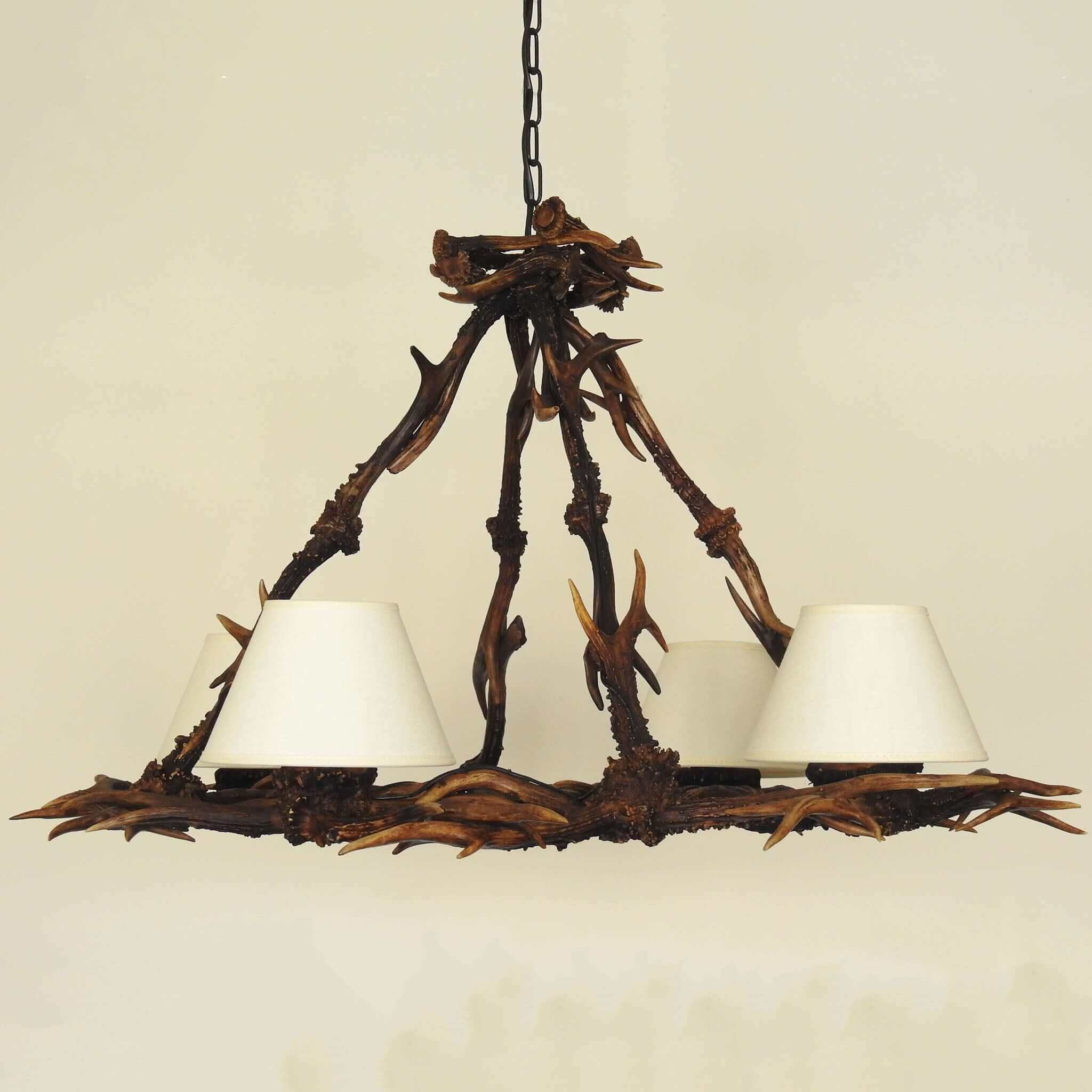 Reo deer antler chandelier with shades.