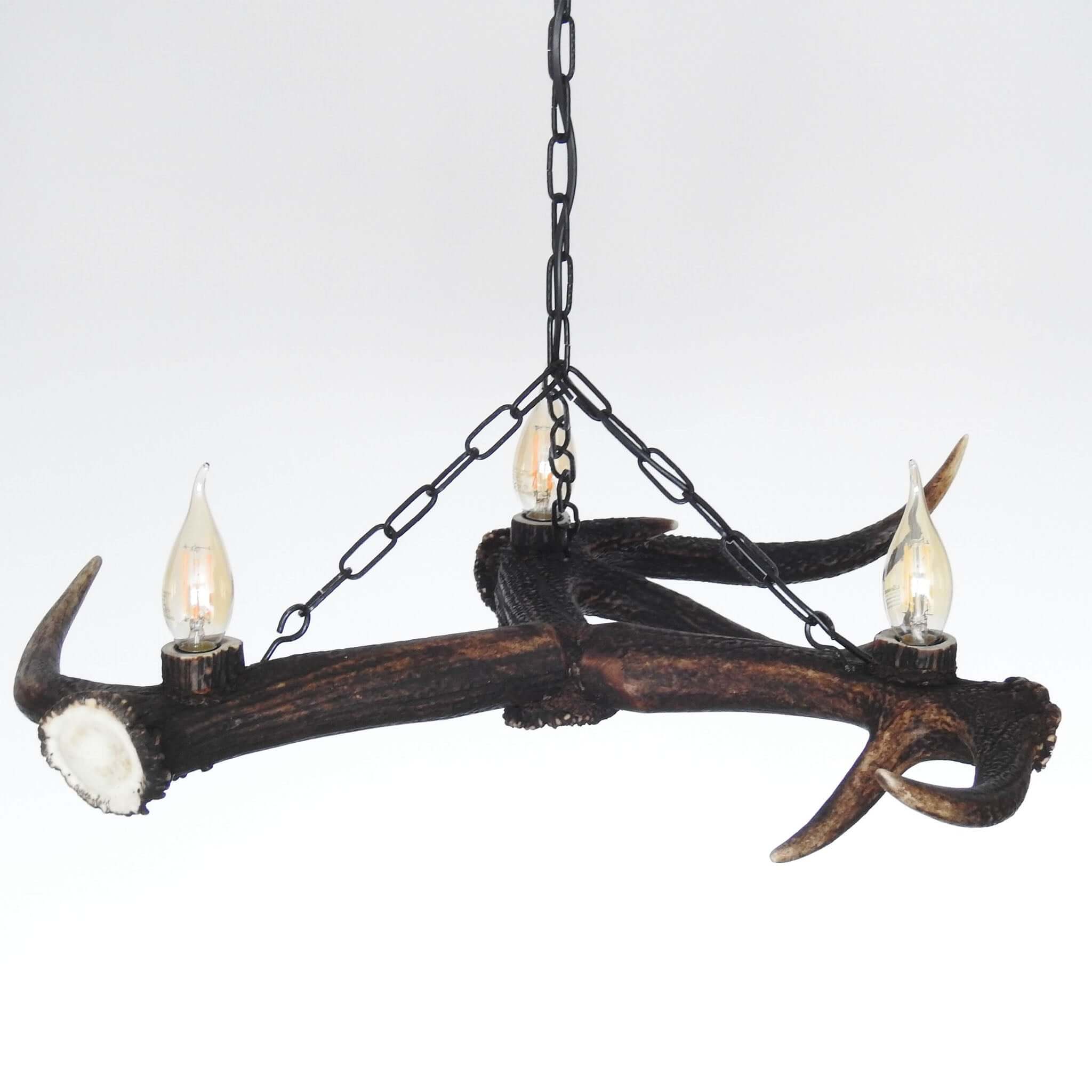 Rustic style antler chandelier fo 3 lights.